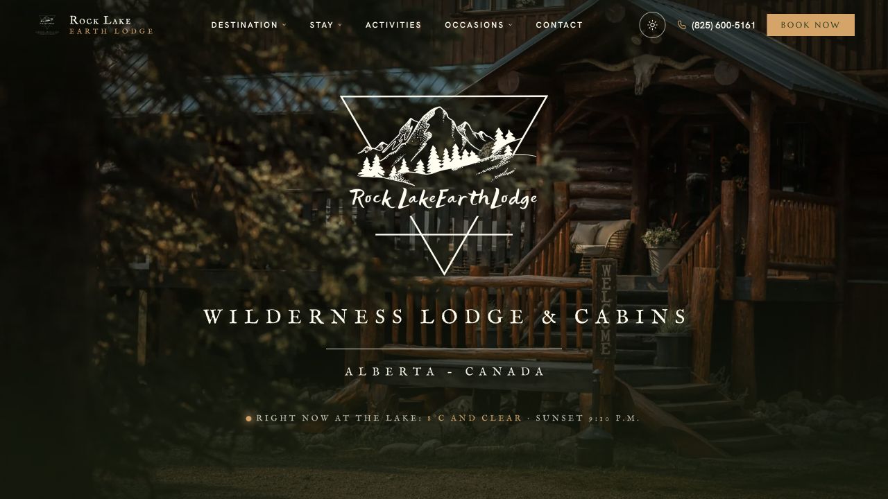Rock Lake Earth Lodge website shown on a laptop